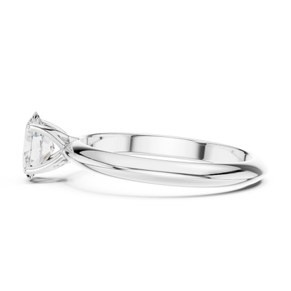 Side view of white gold oval cut diamond solitaire ring, highlighting prong setting.