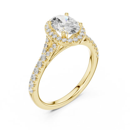 Front view of yellow gold oval halo ring with pav茅 split shank band and center diamond