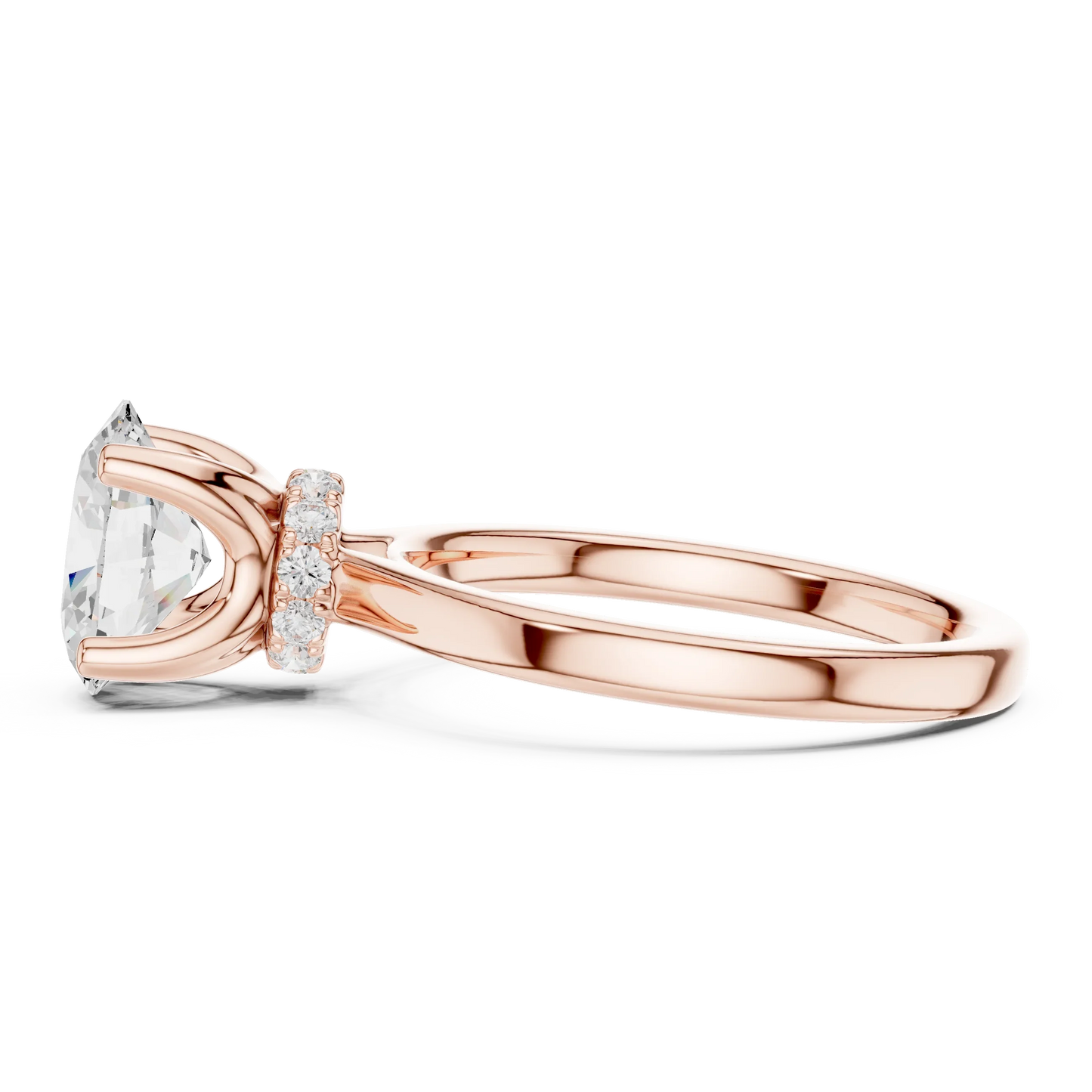 Side view of rose gold oval cut solitaire ring highlighting hidden halo and domed band structure
