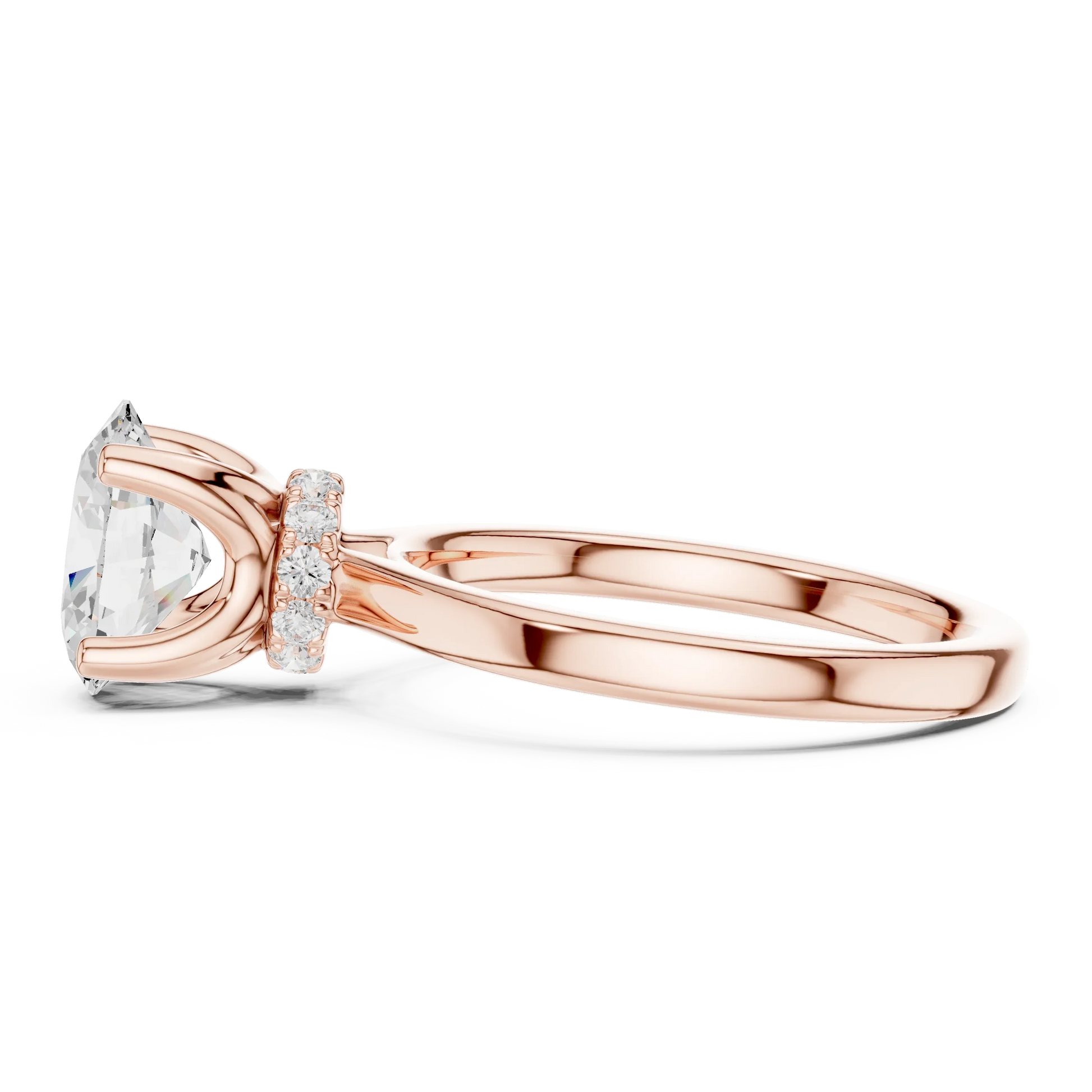 Side view of rose gold oval cut solitaire ring highlighting hidden halo and domed band structure