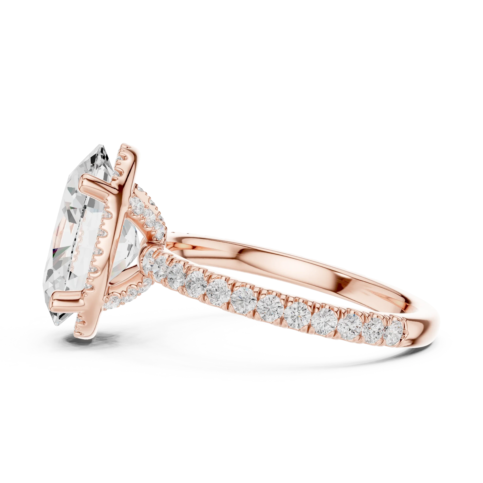 Side view of rose gold oval cut solitaire ring highlighting hidden halo and thin pav茅 band design