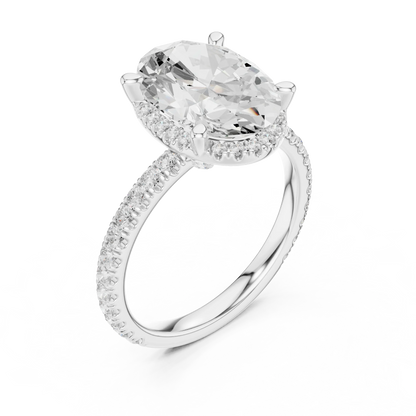 Front view of white gold oval cut solitaire ring with hidden halo and thin pav茅 diamond band and lab-created diamond