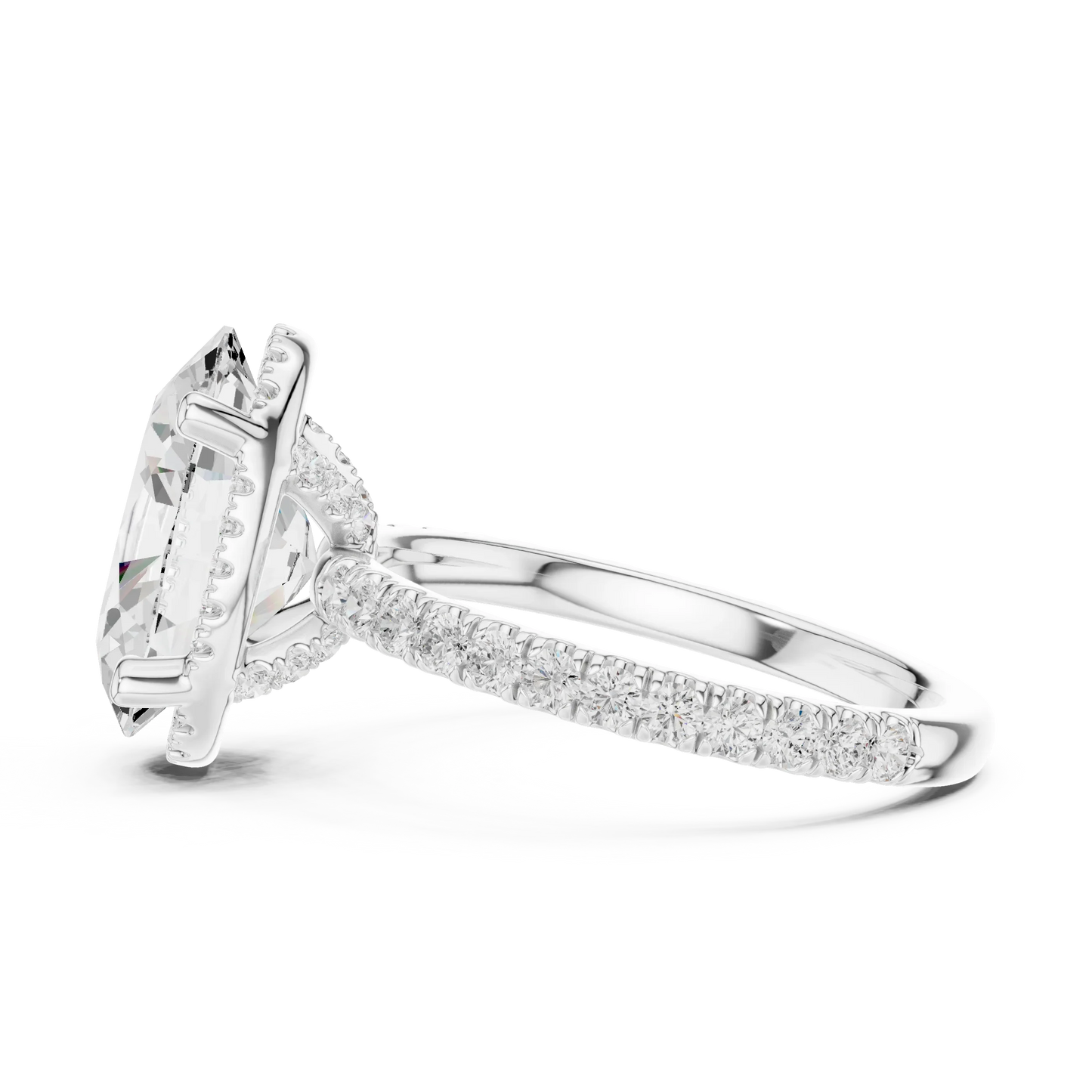 Side view of white gold oval cut solitaire ring highlighting hidden halo and thin pav茅 band design