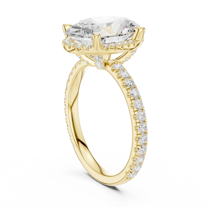 Back side view of yellow gold oval cut solitaire ring showing hidden halo and thin pav茅 band details