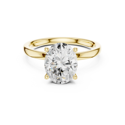 Lab-grown oval cut solitaire ring in yellow gold with smooth domed band