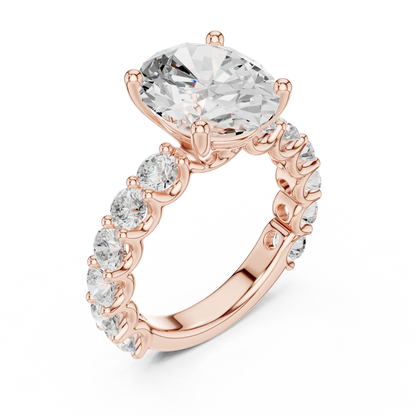 Front view of rose gold oval cut solitaire ring with shared prong large stone band and center stone