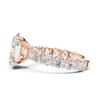 Side profile of rose gold oval cut solitaire ring with shared prong large stone band and elevated center stone