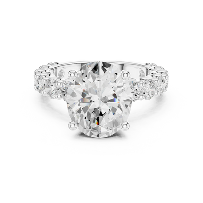 Lab-grown oval cut solitaire ring in white gold with shared prong large stone band