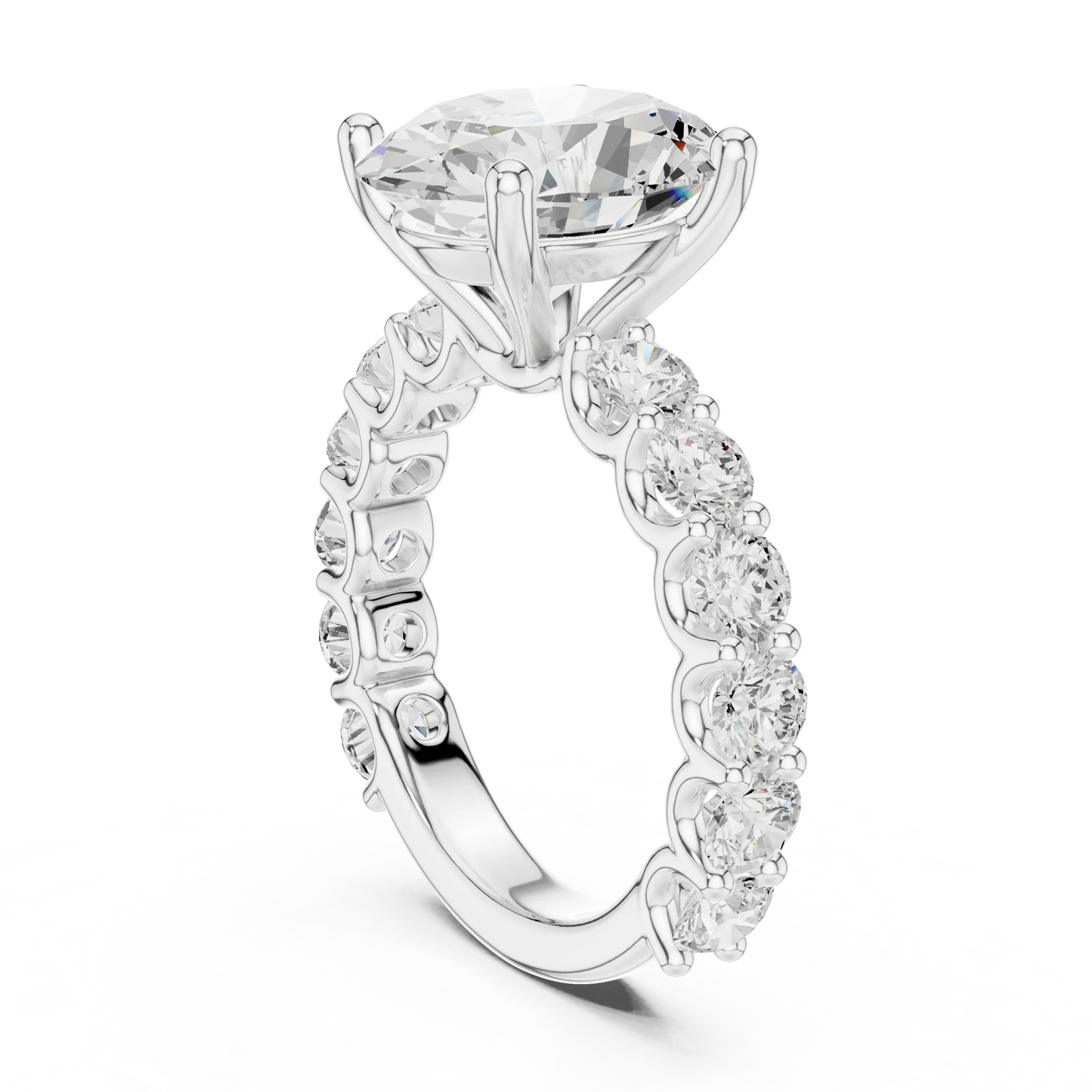 Back side view of white gold oval cut solitaire ring showing shared prong large stone band and setting details