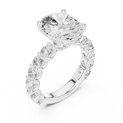 Front view of white gold oval cut solitaire ring with shared prong large stone band and center stone