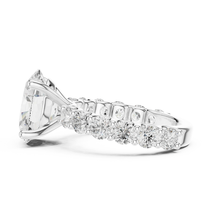 Side view of white gold oval cut solitaire ring with shared prong large stone band and elevated setting