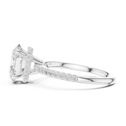 Side view of white gold oval cut solitaire ring highlighting thin pave band and prong setting