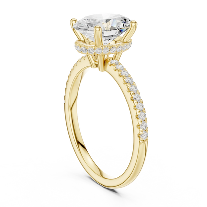 Back side view of yellow gold oval cut solitaire ring showing thin pave band and mounting details