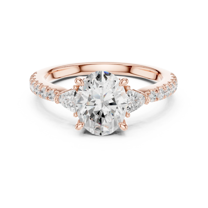 Lab-grown oval cut three stone diamond ring with half moon side stones and pave band in rose gold, top view