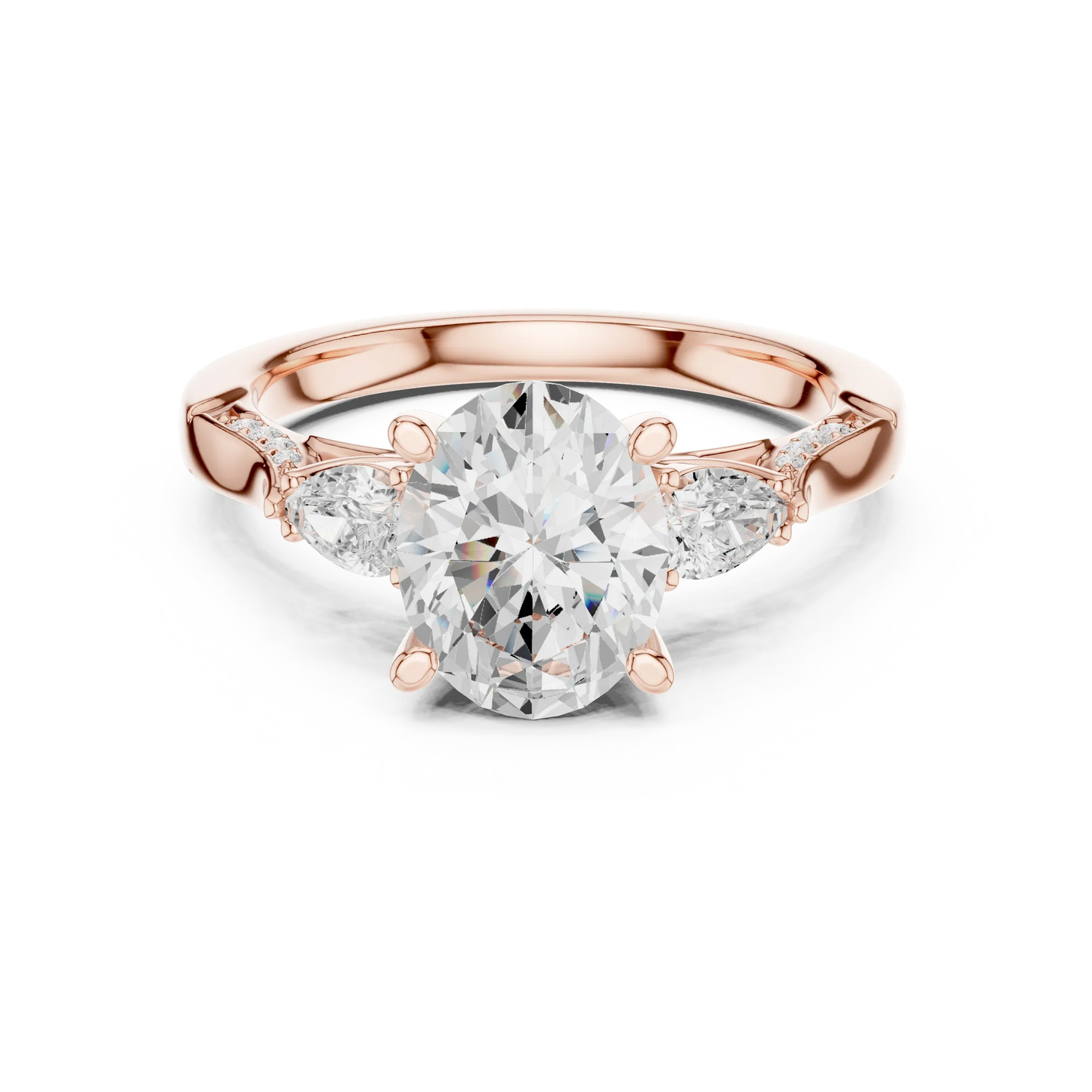 Oval three stone ring in rose gold with pear side stones, accent band and lab-grown diamonds 鈥?Australia