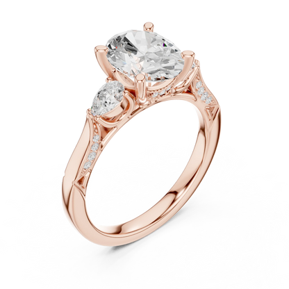 Front view of rose gold oval three stone ring with pear side stones, accent band and lab-grown diamonds 鈥?Australia