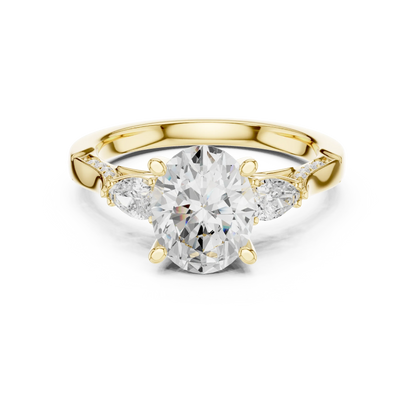 Oval three stone ring in yellow gold with pear side stones, accent band and lab-grown diamonds 鈥?Australia