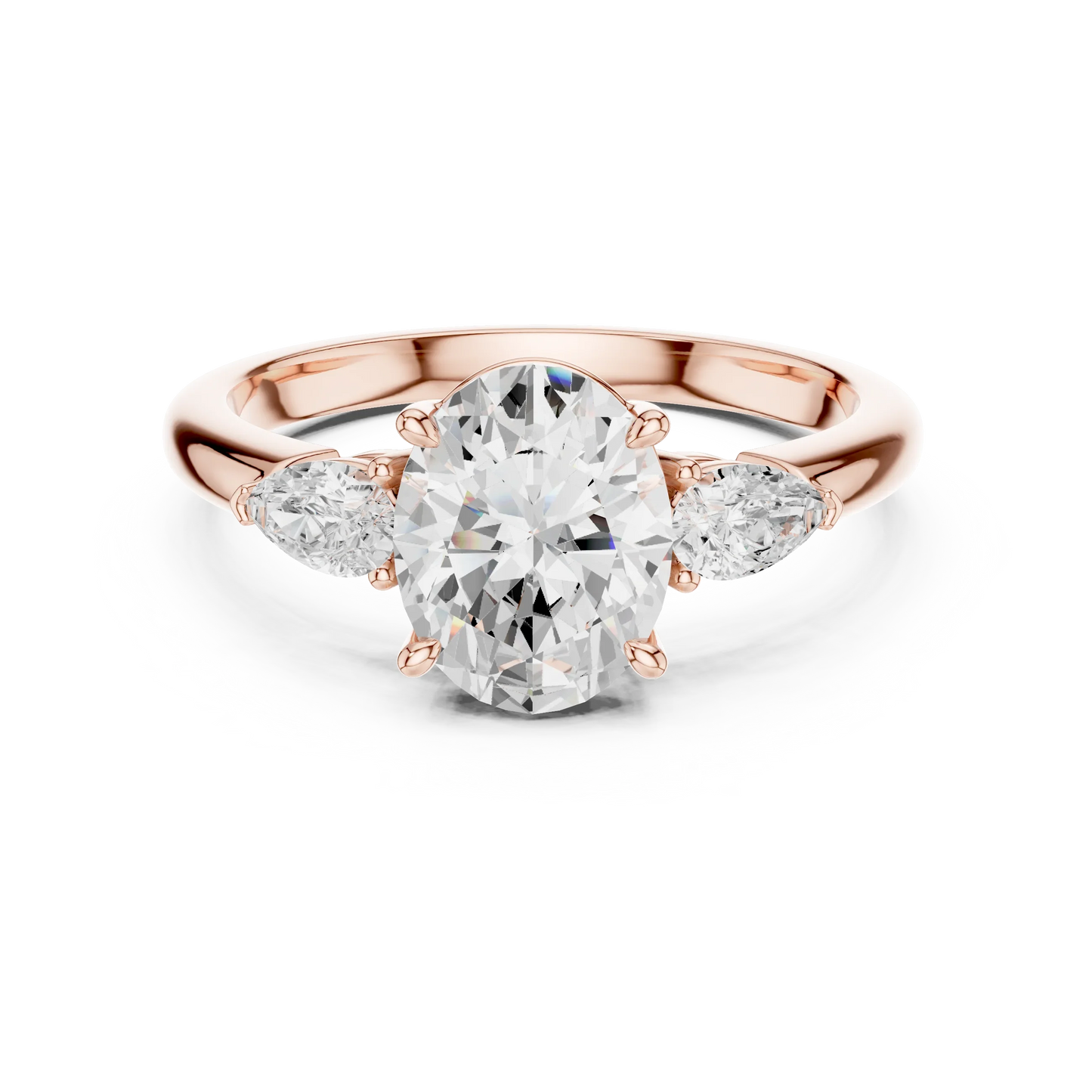 Oval three-stone ring in rose gold with pear side stones and lab-grown diamond 鈥?Australia