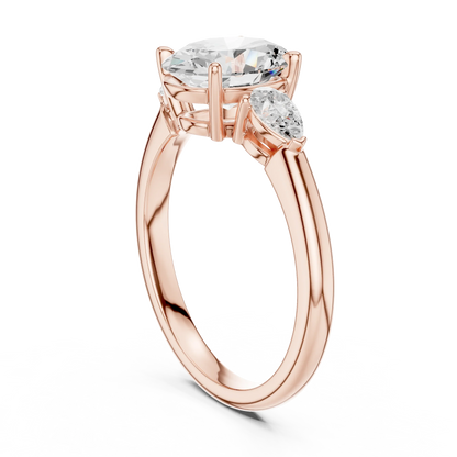 Back side view of rose gold oval three-stone ring with pear side stones and lab-grown diamond 鈥?Australia