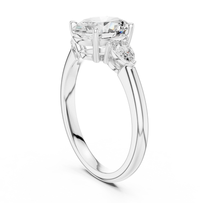 Back side view of white gold oval three-stone ring with pear side stones and lab-grown diamond 鈥?Australia