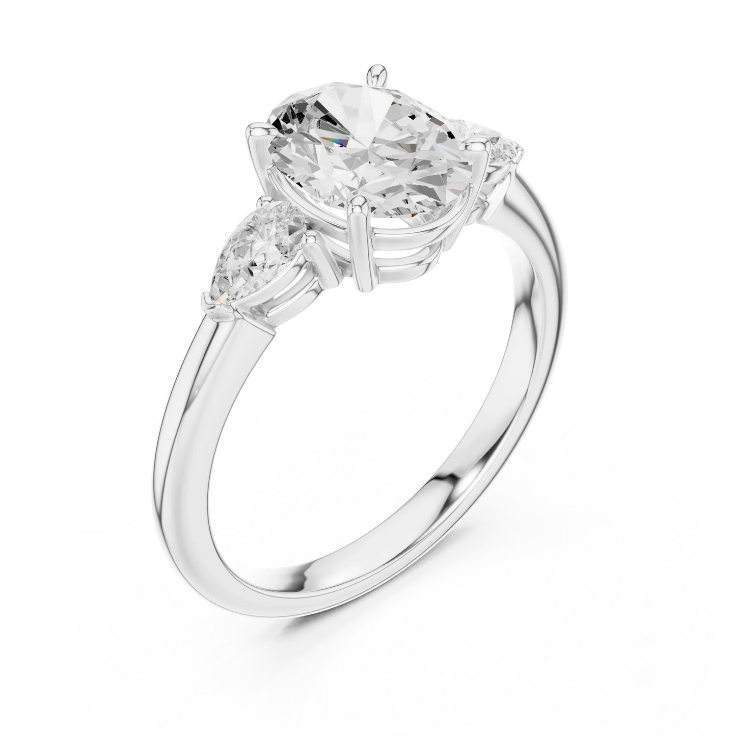 Front view of white gold oval three-stone ring with pear side stones and lab-grown diamond 鈥?Australia