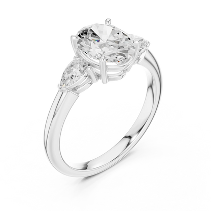Front view of white gold oval three-stone ring with pear side stones and lab-grown diamond 鈥?Australia