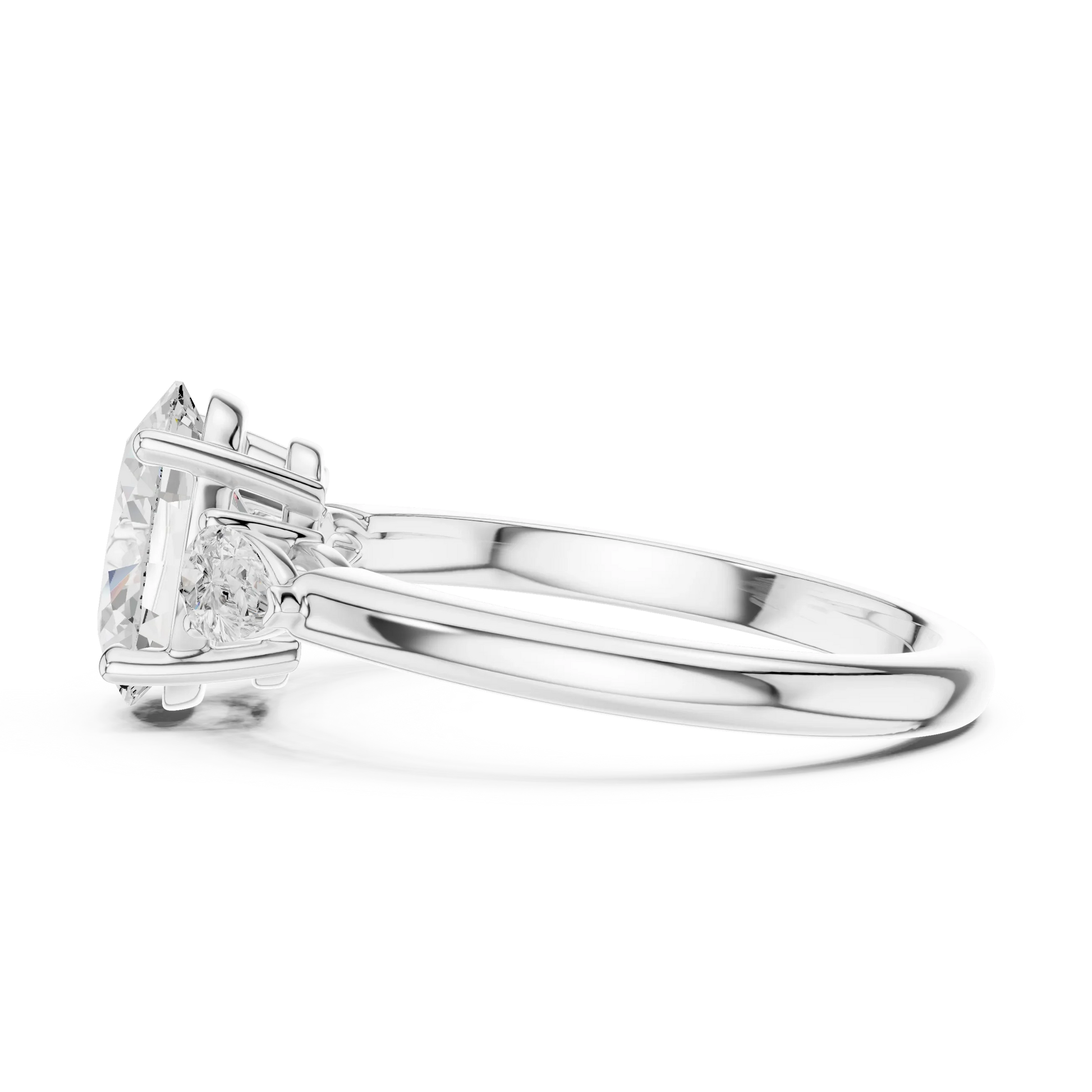 Side view of white gold oval three-stone ring with pear side stones and lab-grown diamond 鈥?Australia