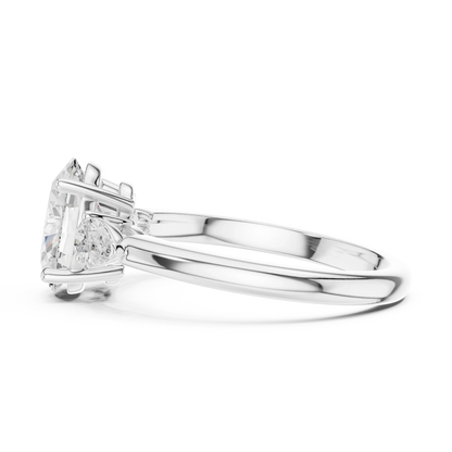 Side view of white gold oval three-stone ring with pear side stones and lab-grown diamond 鈥?Australia