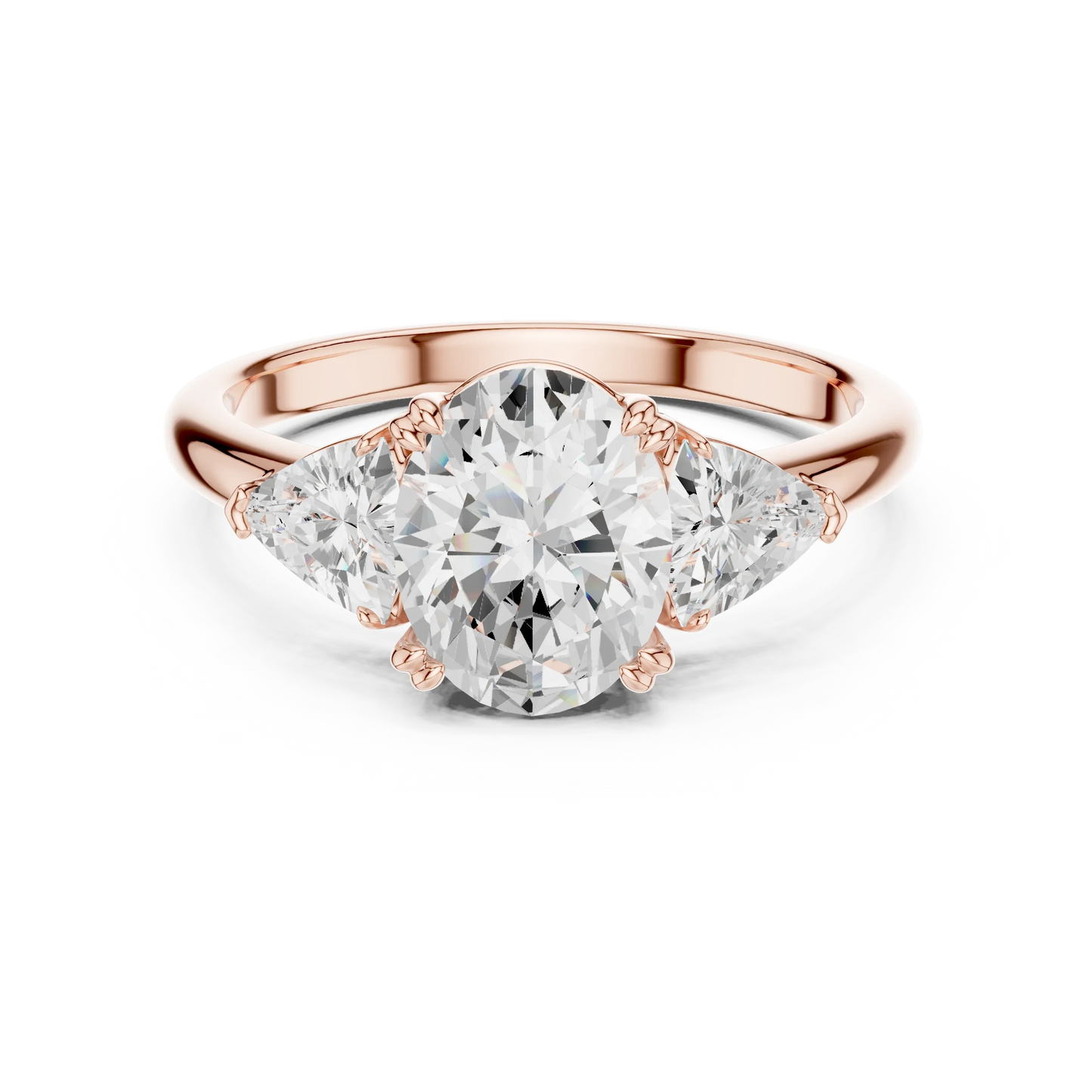 Oval three-stone ring in rose gold with trillion cut side stones and lab-grown diamond 鈥?Australia