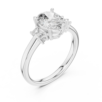 Front view of white gold oval cut three stone diamond ring, showcasing center and side stones