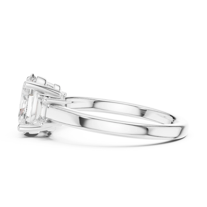 Side view of white gold oval cut three stone diamond ring, highlighting setting profile.
