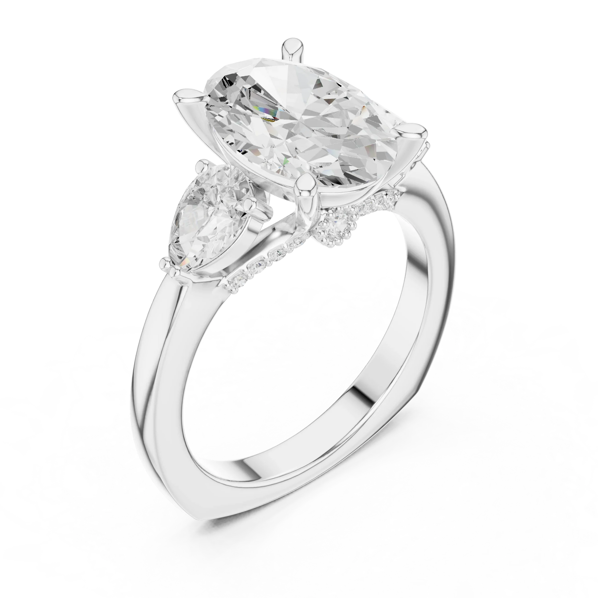 Front view of white gold oval three stone ring with pear side stones and lab-grown diamonds