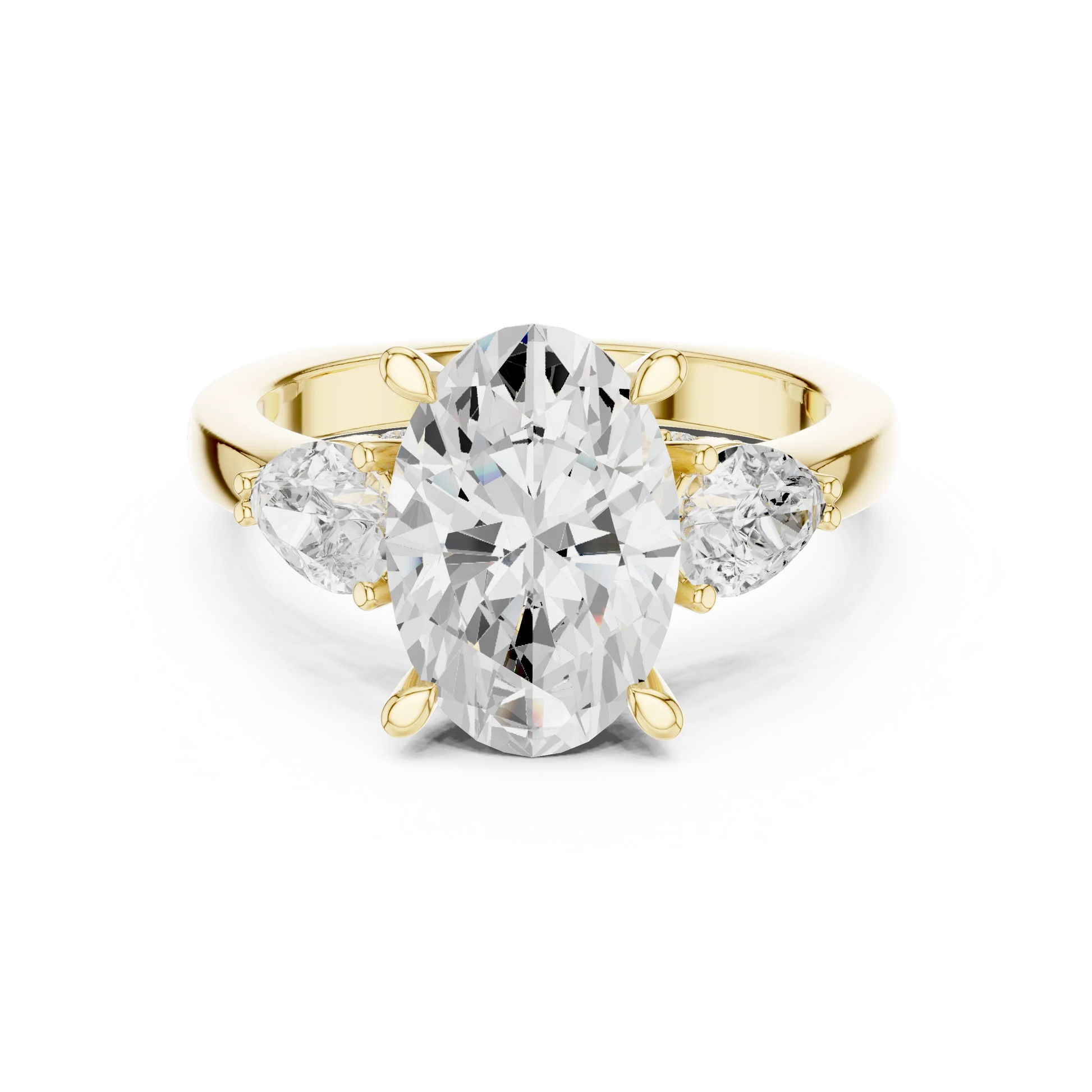 Oval three stone ring with pear side stones and lab-grown diamonds in yellow gold with classic luxury appeal