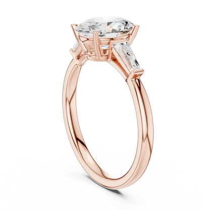 Back view of rose gold oval three stone ring featuring tapered baguette side stones and polished band