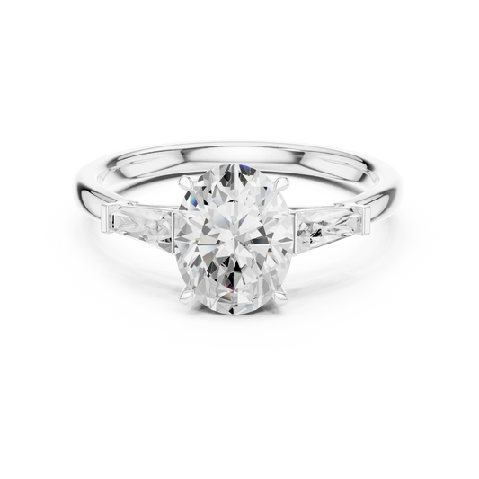 Oval three stone ring with tapered baguette side stones and lab-grown diamonds in white gold, elegant and timeless design, Australia collection