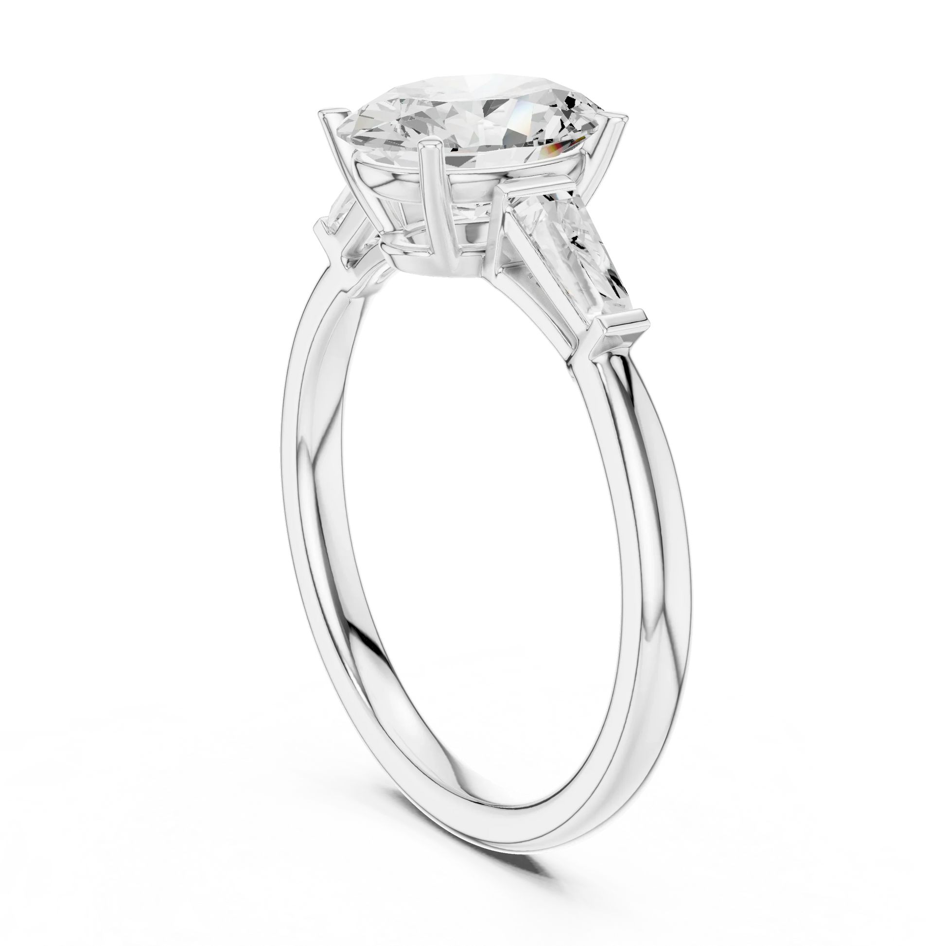 Back view of white gold oval three stone ring featuring tapered baguette side stones and polished band