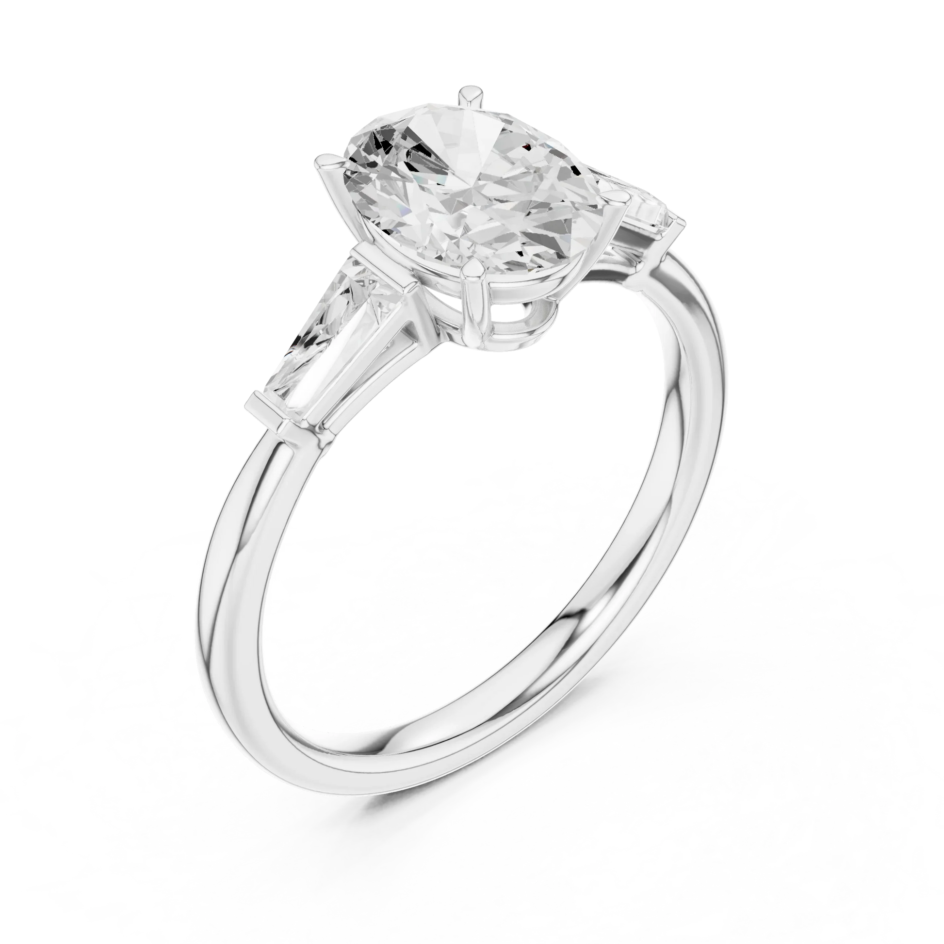 Front view of white gold oval three stone ring with tapered baguette side stones and lab-grown diamonds