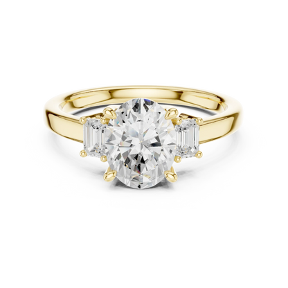 Lab-grown oval cut three stone diamond ring in yellow gold, classic top view.