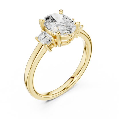 Front view of yellow gold oval three stone diamond ring, emphasizing brilliance.
