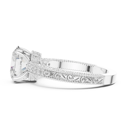 Side view of oval vintage filigree white gold ring with milgrain detailing and channel-set diamond band