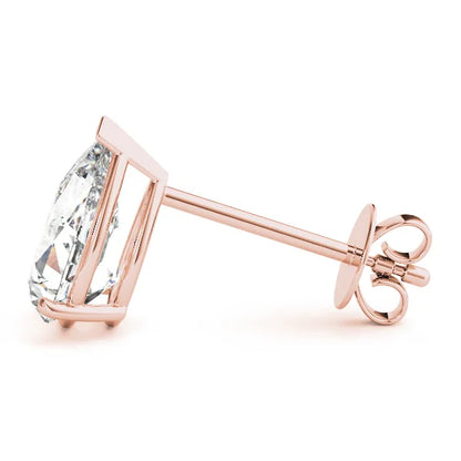 Pear cut diamond in Rose gold stud earrings with a clear gemstone on a white background