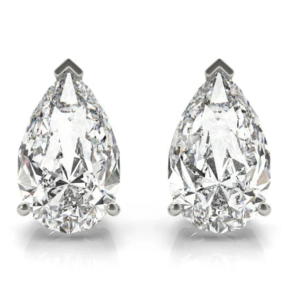 Pair of pear-shaped diamond earrings on a white background