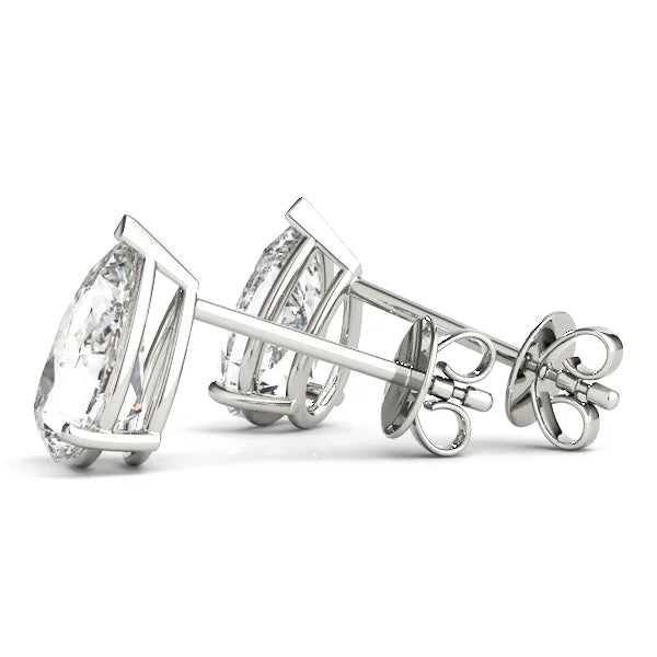 Diamond earrings on a white background with a back view