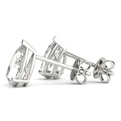 Diamond earrings on a white background with a back view