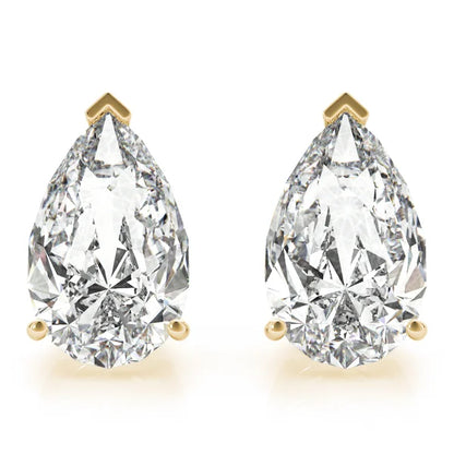 Pair of pear-shaped diamond earrings with gold prongs on a white background