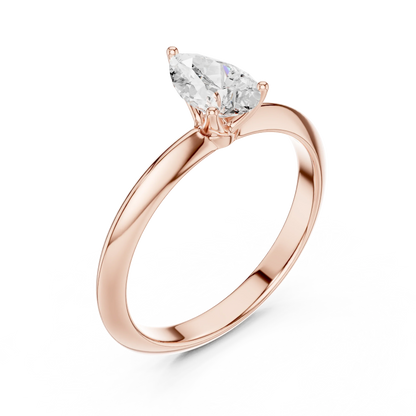 Front view of rose gold pear diamond solitaire ring, showcasing gemstone brilliance