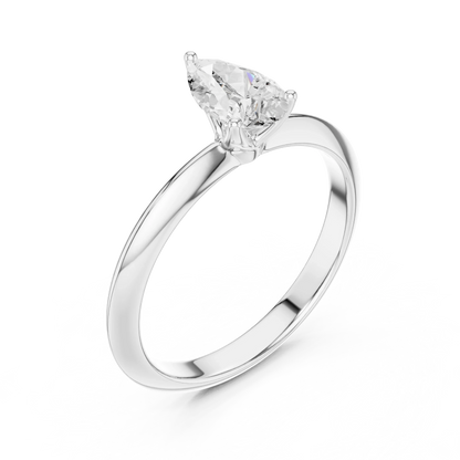 Front view of white gold pear cut diamond solitaire ring, showcasing center stone.