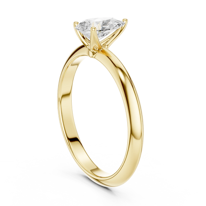 Back side view of yellow gold pear diamond solitaire ring, showing band structure