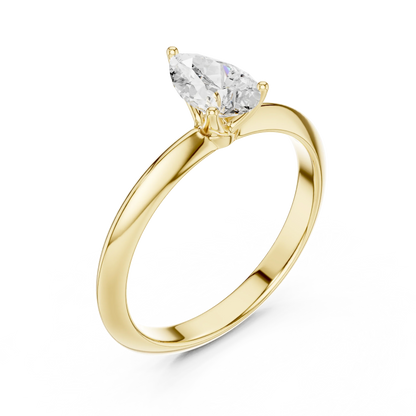 Front view of yellow gold pear diamond solitaire ring, emphasizing brilliance
