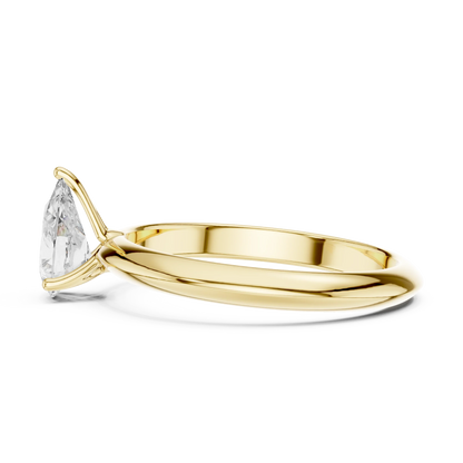 Side profile of yellow gold pear cut diamond solitaire ring, highlighting stone height